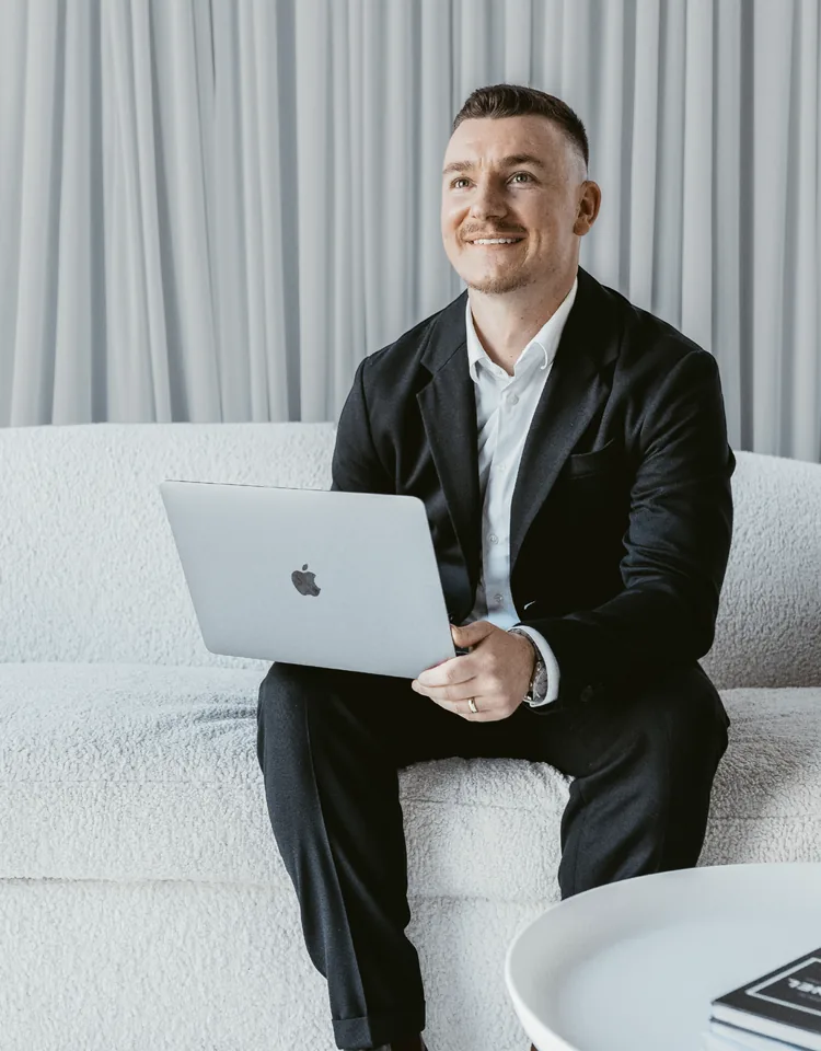 Sam Colthorpe working on a laptop, Business Brother, Marketing Agency Newcastle
